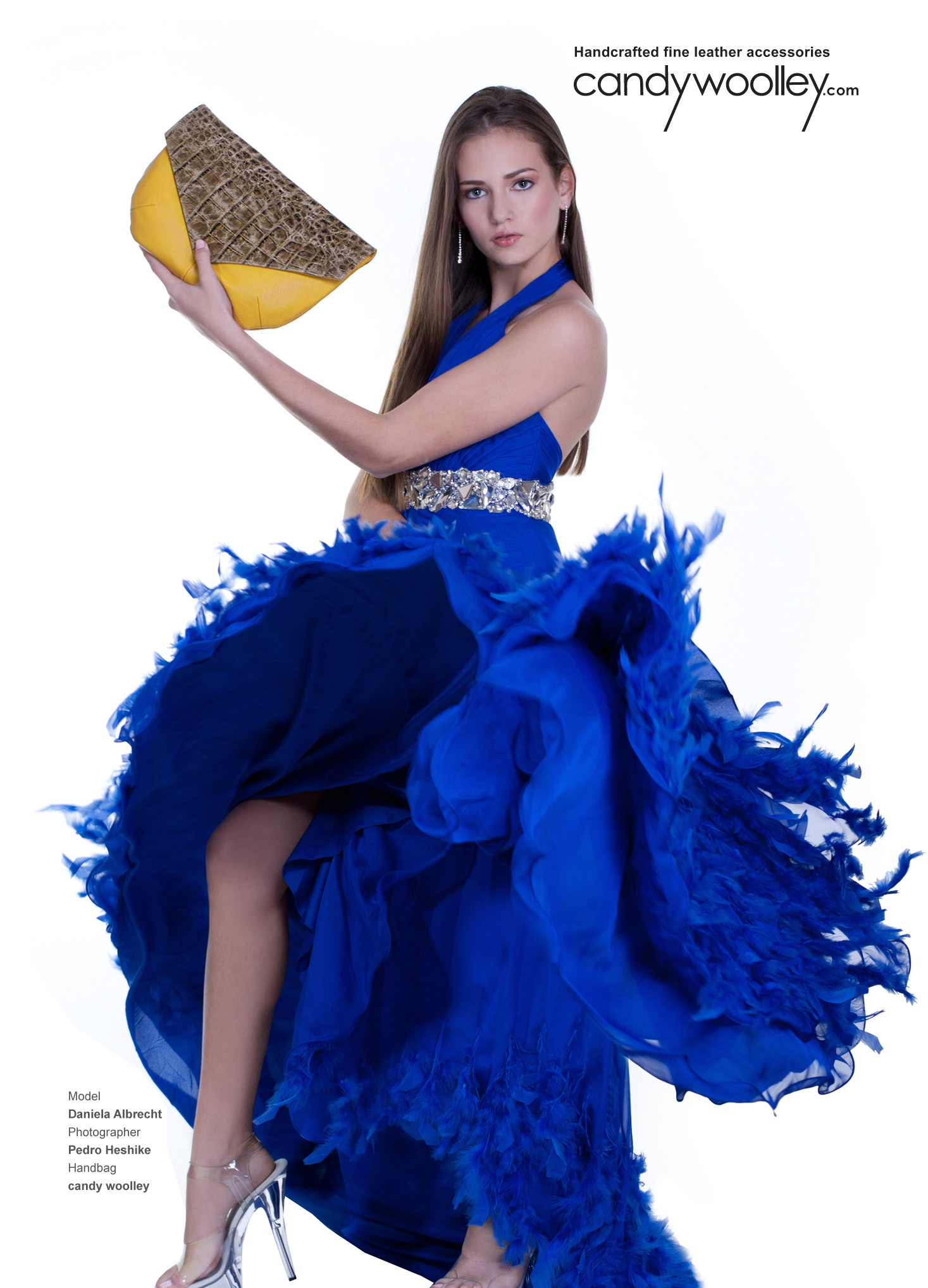 Daniela Albrecht modeling a mustard yellow Candy Woolley clutch